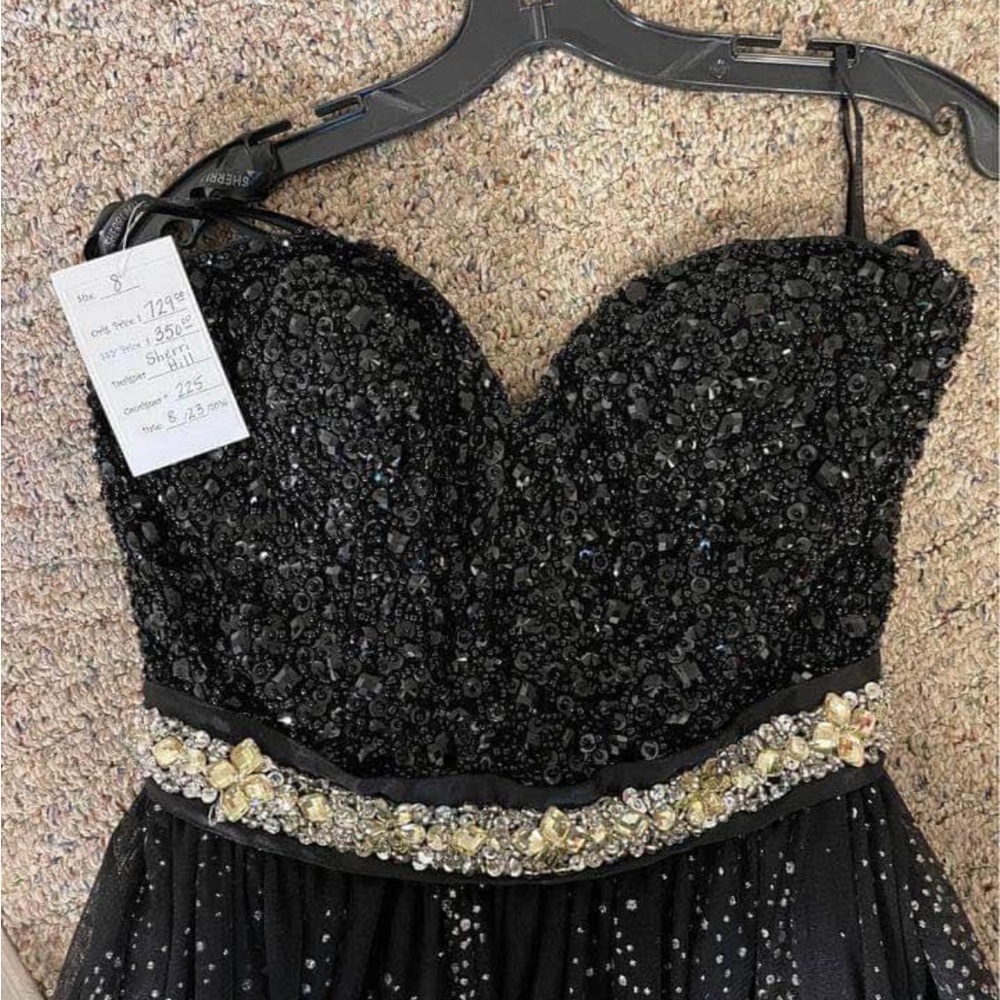 Sherri Hill Designer Gown: shimmery black, a crystal belt & glittered tulle.